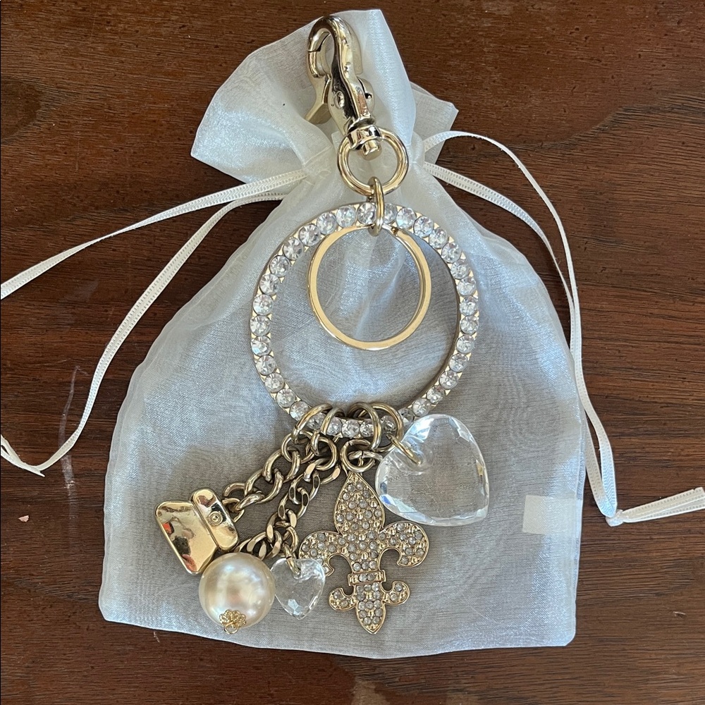 KATHY VAN ZEELAND - EUC Fleur de Lis Crystal Bag Charm